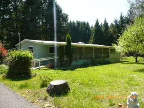 141 Ivy Dr, Cave Junction, OR 97523 photo 1