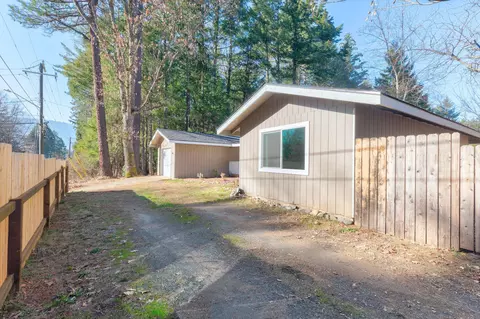 Exterior - 406 E River St, Cave Junction, OR 97523 photo 3 of 11