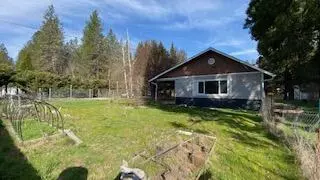 Exterior - 8225 Evans Creek Rd, Rogue River, OR 97537 photo 1 of 12