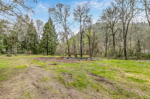 Exterior - 159 Bloom Rd, Wolf Creek, OR 97497 photo 4 of 9