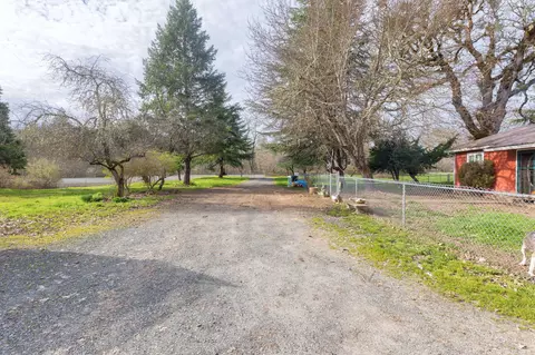 Exterior - 6795 Holland Loop Rd, Cave Junction, OR 97523 photo 7 of 31