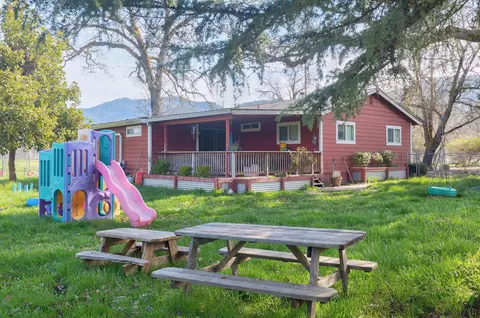 Exterior - 6795 Holland Loop Rd, Cave Junction, OR 97523 photo 5 of 31