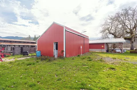 Exterior - 6795 Holland Loop Rd, Cave Junction, OR 97523 photo 9 of 31