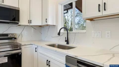 Kitchen - 141 NE D St, Willamina, OR 97396 photo 4 of 5