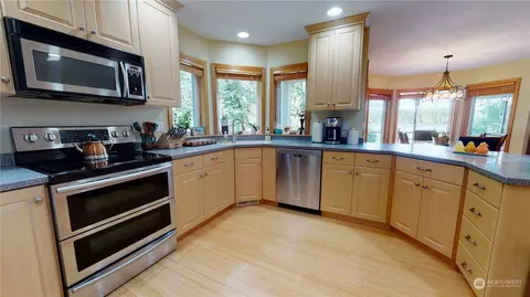 Kitchen - 2031 E Mason Lake Dr E, Grapeview, WA 98546 photo 2 of 2