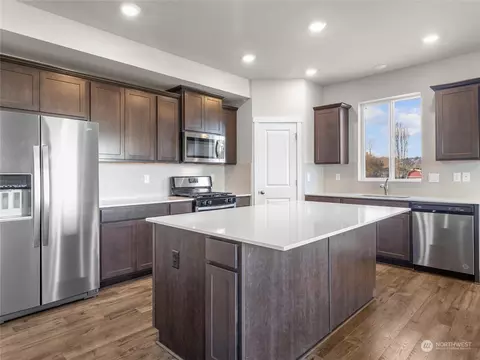 Kitchen - 335 Belfair St SW, Orting, WA 98360 photo 2 of 4