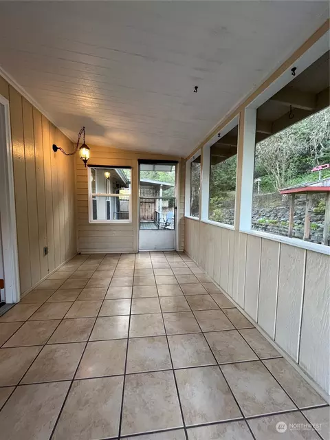 Exterior - 7441 E Grapeview Loop Rd, Allyn, WA 98524 photo 2 of 12