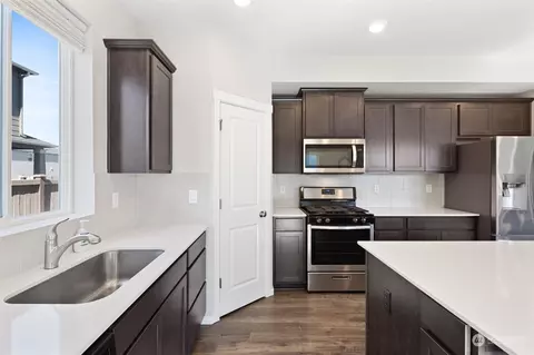 Kitchen - 308 Belfair St SW, Orting, WA 98360 photo 4 of 5