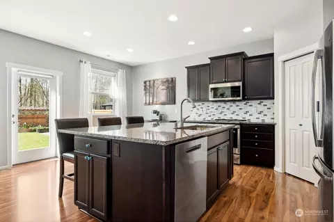 Kitchen - 913 Ofarrell Ln NW, Orting, WA 98360 photo 2 of 3