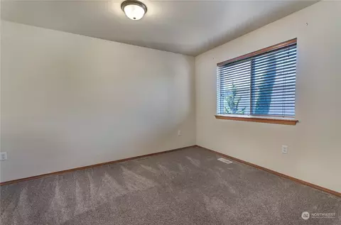 Bedroom - 1517 Daffodil Ave NE, Orting, WA 98360 photo 6 of 7