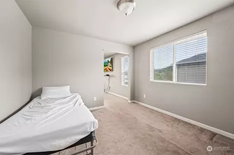 Bedroom - 217 Gipple St NE, Orting, WA 98360 photo 9 of 10