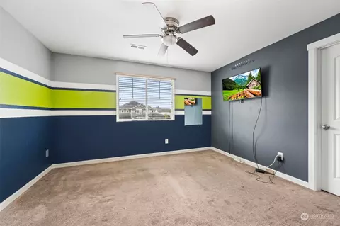 Bedroom - 217 Gipple St NE, Orting, WA 98360 photo 8 of 10