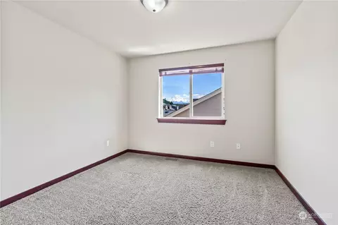 Bedroom - 1501 Riddell Ave NE, Orting, WA 98360 photo 4 of 7