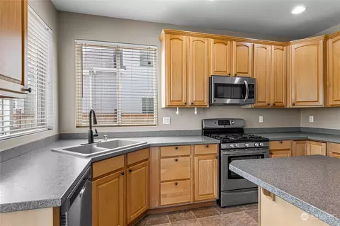 Kitchen - 809 Williams St NW, Orting, WA 98360 photo 2 of 3