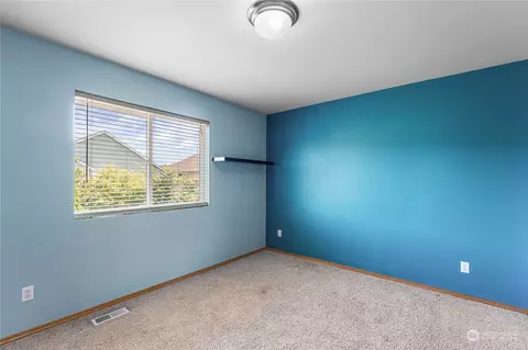 Bedroom - 809 Williams St NW, Orting, WA 98360 photo 5 of 8