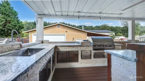 Kitchen - 320 Bowlin Ave NE, Orting, WA 98360 photo 7 of 7