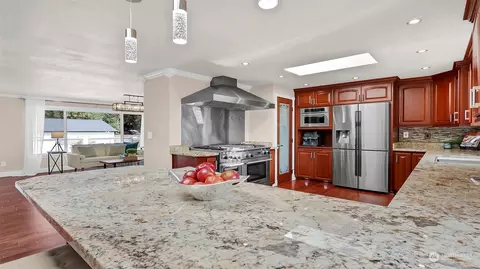 Kitchen - 320 Bowlin Ave NE, Orting, WA 98360 photo 6 of 7