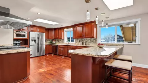 Kitchen - 320 Bowlin Ave NE, Orting, WA 98360 photo 1 of 7