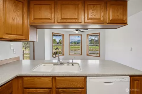 Kitchen - 101 Mcmahon Ln SW, Orting, WA 98360 photo 2 of 2
