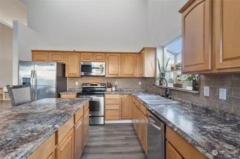 Kitchen - 805 Williams St NW, Orting, WA 98360 photo 3 of 4