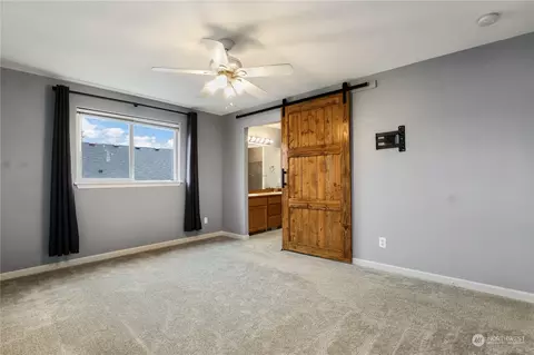 Bedroom - 207 Thompson Ave NW, Orting, WA 98360 photo 2 of 8