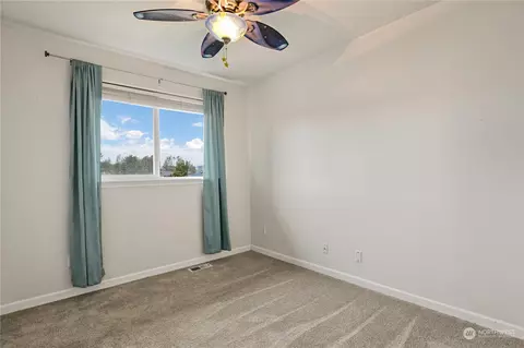 Bedroom - 207 Thompson Ave NW, Orting, WA 98360 photo 5 of 8