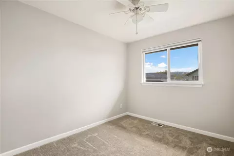 Bedroom - 207 Thompson Ave NW, Orting, WA 98360 photo 3 of 8