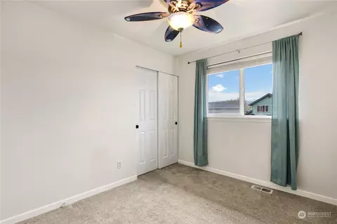 Bedroom - 207 Thompson Ave NW, Orting, WA 98360 photo 6 of 8
