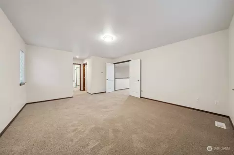 Bedroom - 1210 Quail Ave SW, Orting, WA 98360 photo 2 of 5