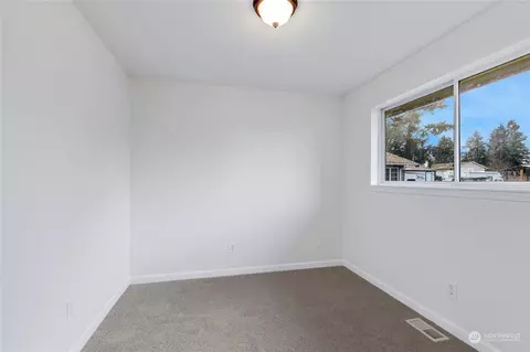 Bedroom - 212 170th St E, Spanaway, WA 98387 photo 2 of 4