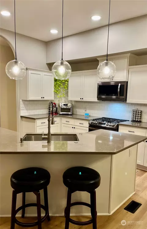 Kitchen - 205 Thompson Ave NW, Orting, WA 98360 photo 3 of 3