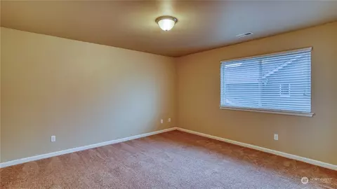 Bedroom - 510 Carrier Ave SW, Orting, WA 98360 photo 5 of 7