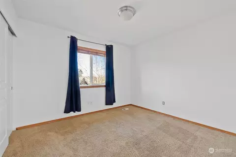 Bedroom - 113 Williams Blvd NE, Orting, WA 98360 photo 3 of 8