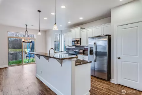 Kitchen - 309 Phoenix Ave SW, Orting, WA 98360 photo 4 of 5