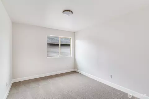 Bedroom - 309 Phoenix Ave SW, Orting, WA 98360 photo 4 of 7