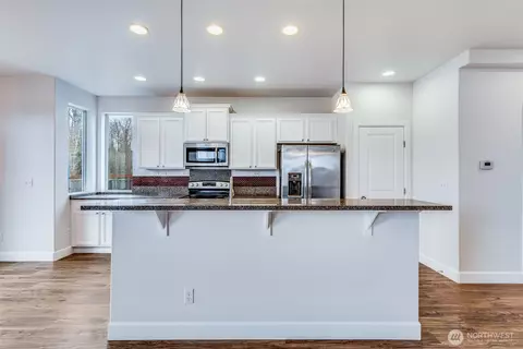 Kitchen - 309 Phoenix Ave SW, Orting, WA 98360 photo 3 of 5