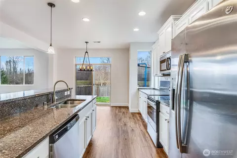 Kitchen - 309 Phoenix Ave SW, Orting, WA 98360 photo 5 of 5