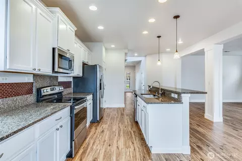Kitchen - 309 Phoenix Ave SW, Orting, WA 98360 photo 2 of 5