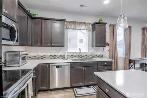 Kitchen - 106 Hickory Ave SW #45, Orting, WA 98360 photo 1 of 3
