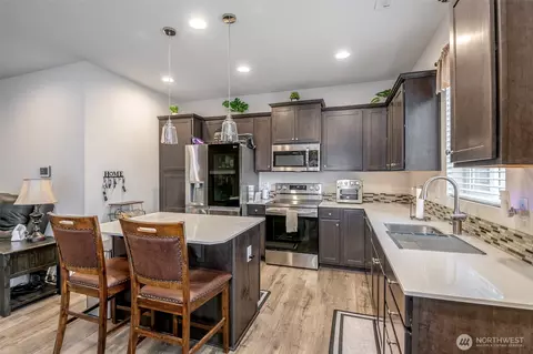 Kitchen - 106 Hickory Ave SW #45, Orting, WA 98360 photo 3 of 3