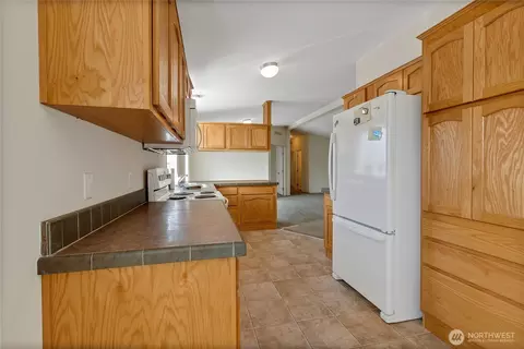 Kitchen - 920 336th St E, Roy, WA 98580 photo 2 of 3