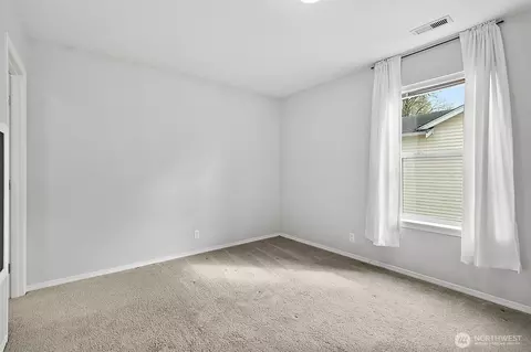 Bedroom - 1002 Daffodil Ave NE, Orting, WA 98360 photo 3 of 7