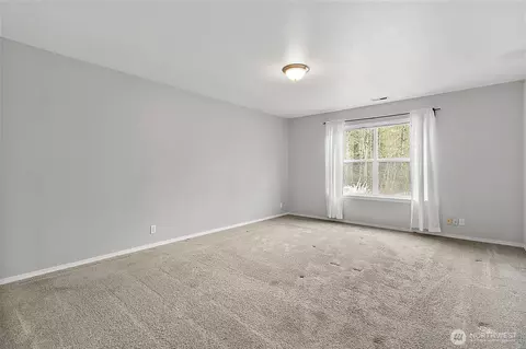 Bedroom - 1002 Daffodil Ave NE, Orting, WA 98360 photo 5 of 7