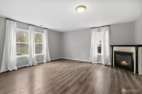 Living - 1002 Daffodil Ave NE, Orting, WA 98360 photo 2 of 4