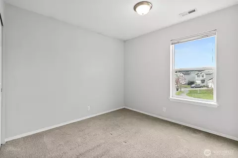 Bedroom - 1002 Daffodil Ave NE, Orting, WA 98360 photo 1 of 7