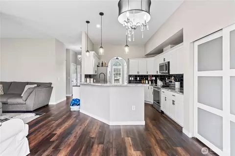 Kitchen - 303 Eldredge Ct NW, Orting, WA 98360 photo 2 of 3