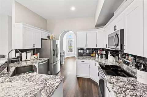 Kitchen - 303 Eldredge Ct NW, Orting, WA 98360 photo 3 of 3