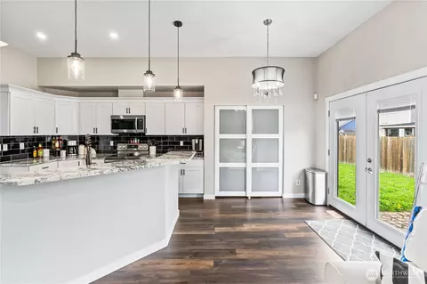 Kitchen - 303 Eldredge Ct NW, Orting, WA 98360 photo 1 of 3
