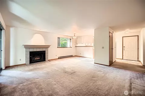 Living - 9816 NE 142nd Pl #E102, Kirkland, WA 98034 photo 1 of 3