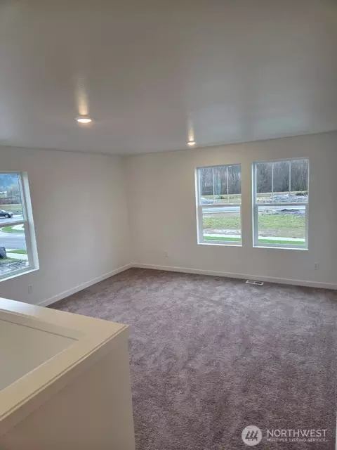 Living - 710 Teetor Cir NW #LOT 5, Orting, WA 98360 photo 2 of 3